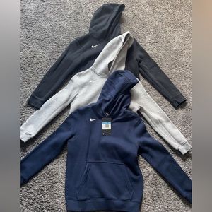 Three Nike hoodies size medium
